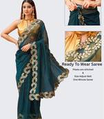 Teal net solid saree with blouse