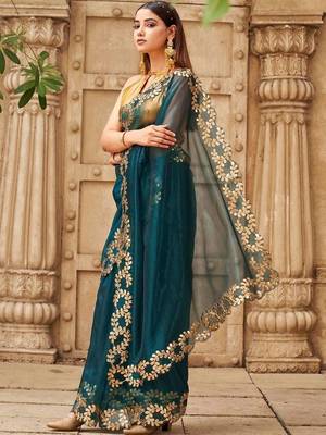 Teal net solid saree with blouse 2
