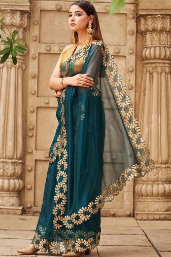 Teal net solid saree with blouse