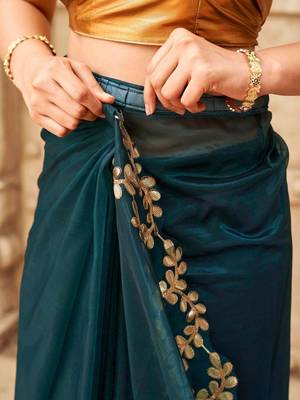 Teal net solid saree with blouse 3