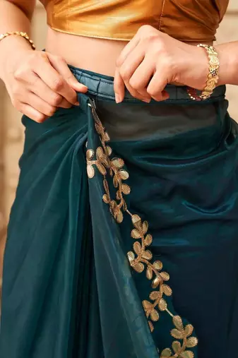 Teal net solid saree with blouse