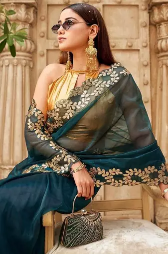 Teal net solid saree with blouse
