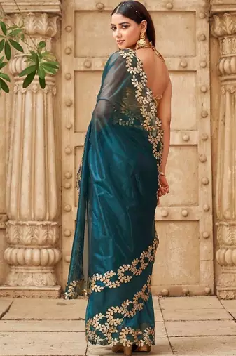 Teal net solid saree with blouse