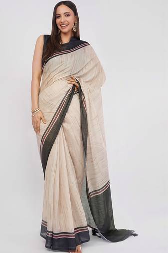 Off white pure linen woven design saree with blouse