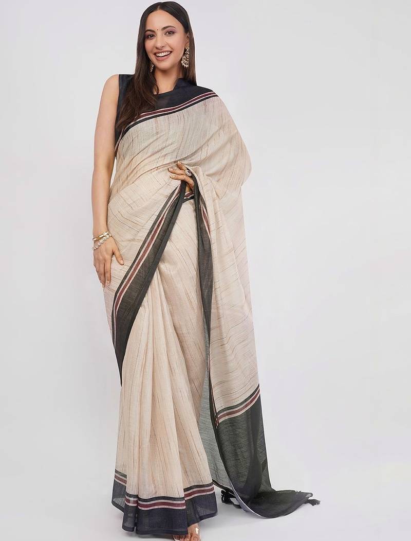 Off white pure linen woven design saree with blouse