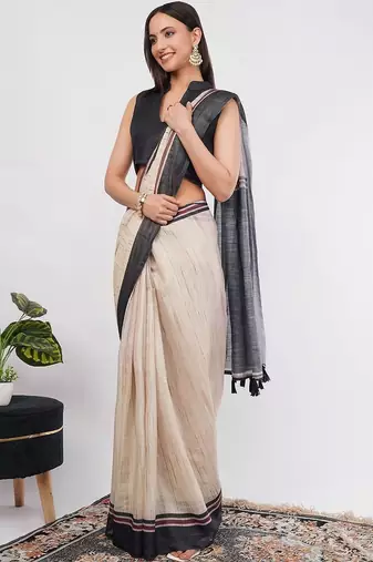 Off white pure linen woven design saree with blouse