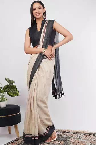 Off white pure linen woven design saree with blouse