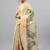 Cream tissue printed saree with blouse