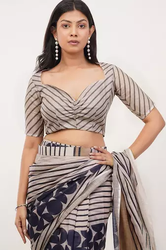 Beige linen printed saree with blouse