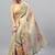 Beige tissue printed saree with blouse