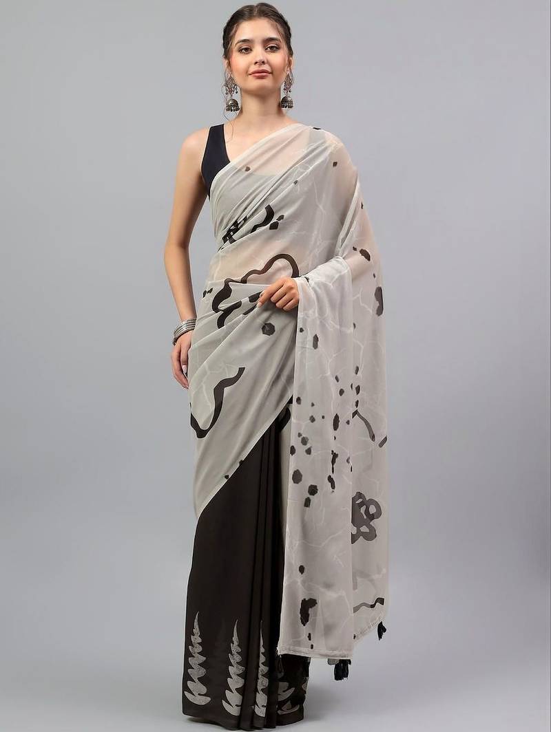 Off white pure georgette printed saree with blouse
