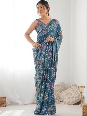 Teal pure georgette printed saree with blouse 1
