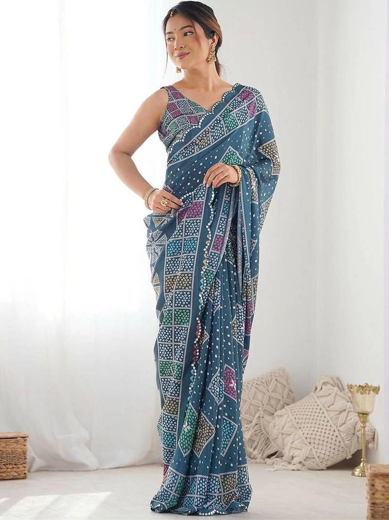 Teal pure georgette printed saree with blouse