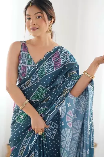 Teal pure georgette printed saree with blouse