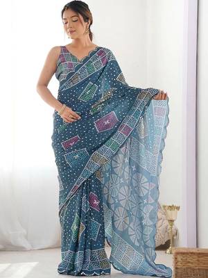 Teal pure georgette printed saree with blouse 5
