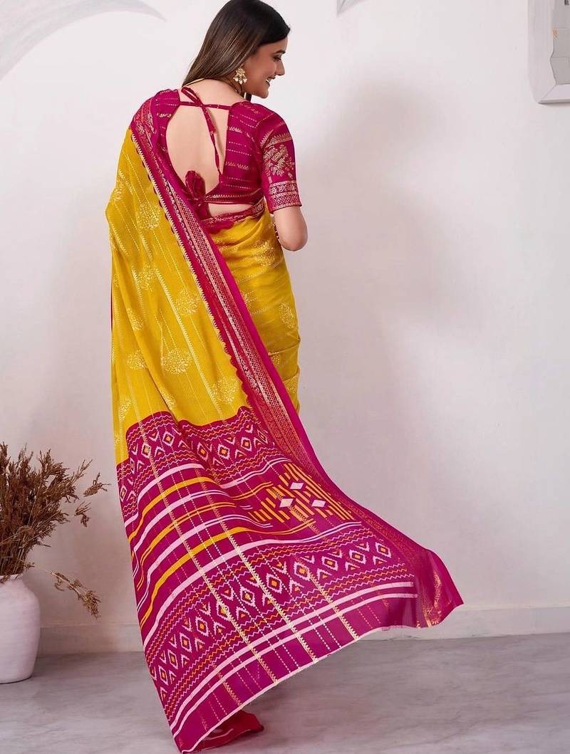 Yellow pure georgette woven design saree with blouse