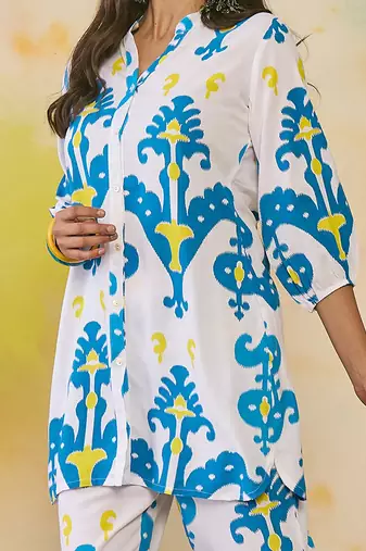 Women Printed Regular Kurti with Trousers