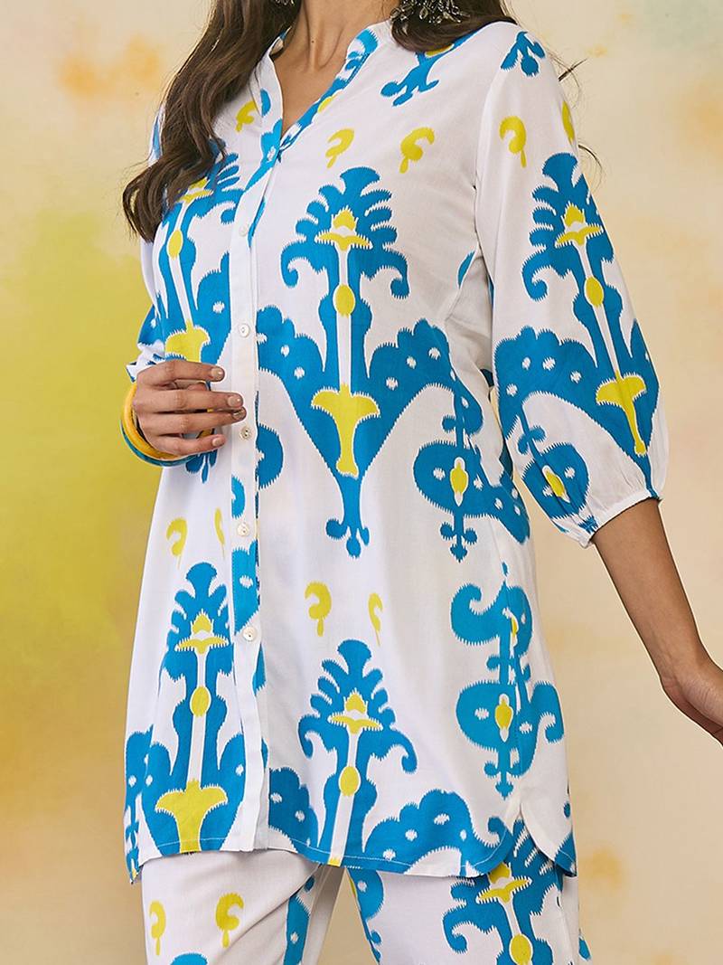 Women Printed Regular Kurti with Trousers