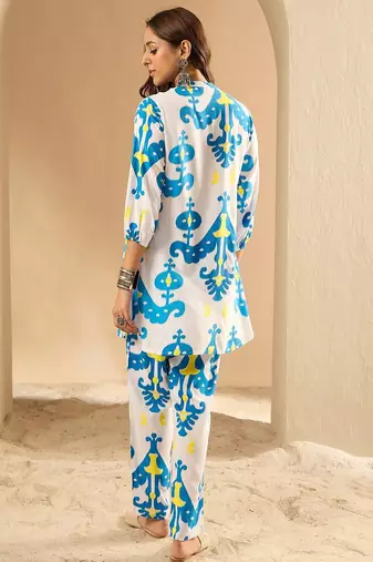 Women Printed Regular Kurti with Trousers