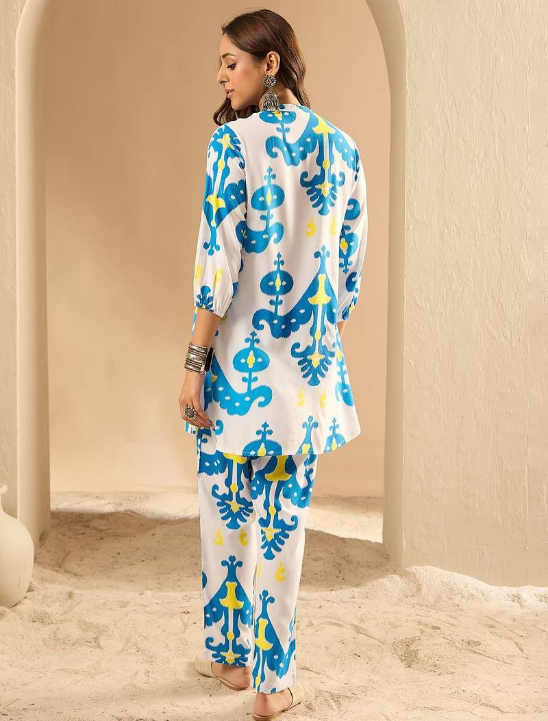 Women Printed Regular Kurti with Trousers