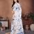 Off white linen printed saree with blouse