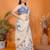 Off white linen printed saree with blouse
