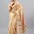 Beige tissue printed saree with blouse