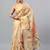 Beige tissue printed saree with blouse