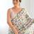 Off white pure georgette printed saree with blouse