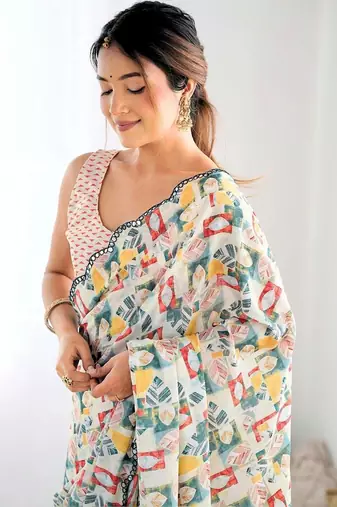 Off white pure georgette printed saree with blouse