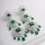 Silver plated emerald green dangler earrings