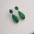 Silver plated emerald green pear drop earrings