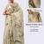 Cream tissue printed saree with blouse