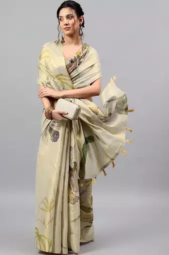Cream tissue printed saree with blouse