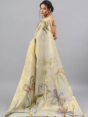 Cream tissue printed saree with blouse 4