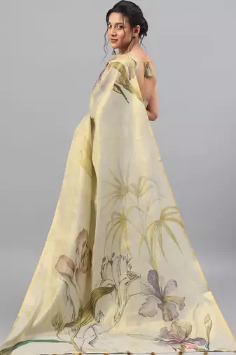 Cream tissue printed saree with blouse