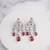 Silver plated ruby red chandelier drop earrings