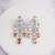 Silver plated light orange chandelier drop earrings