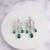 Silver plated emerald green chandelier drop earrings