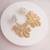 Golden floral dangler earrings