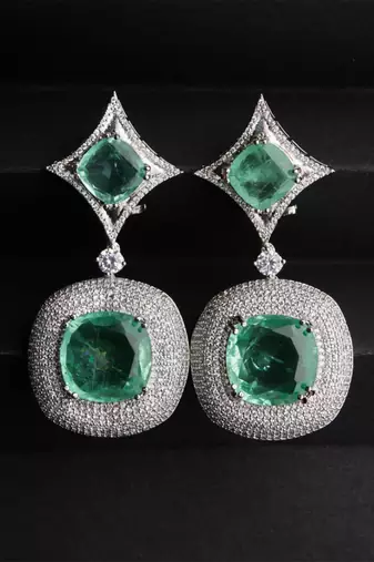 Silver plated light green stone drop earrings