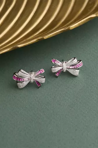 Silver plated pink bow stud earrings