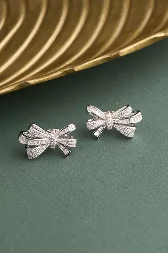Silver plated diamond bow stud earrings
