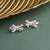Silver plated diamond bow stud earrings