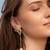 Golden linear chain drop earrings