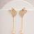 Golden linear chain drop earrings