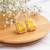 Gold plated yellow stone stud earrings