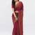 Maroon tissue embellished saree with blouse