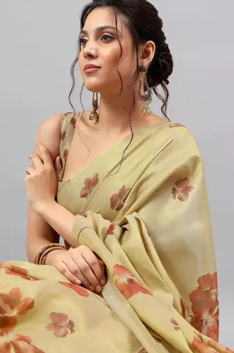 Cream tissue printed saree with blouse