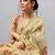 Cream tissue printed saree with blouse